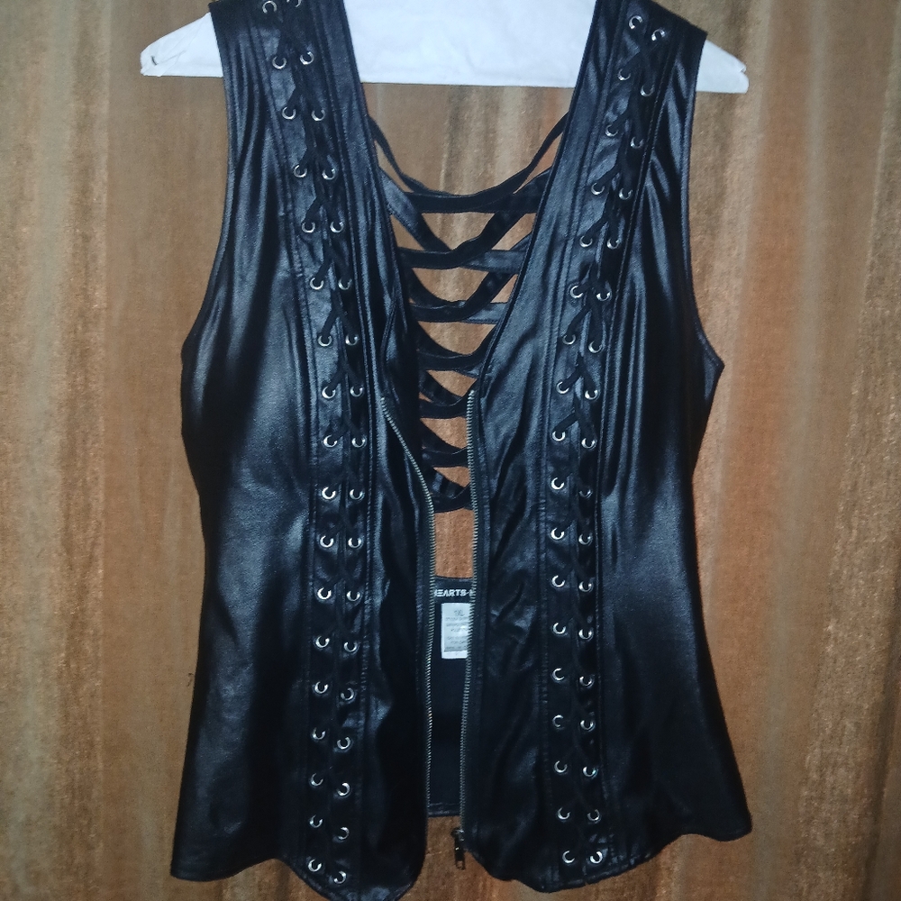 Sleeveless zipper top with cross cut Back
